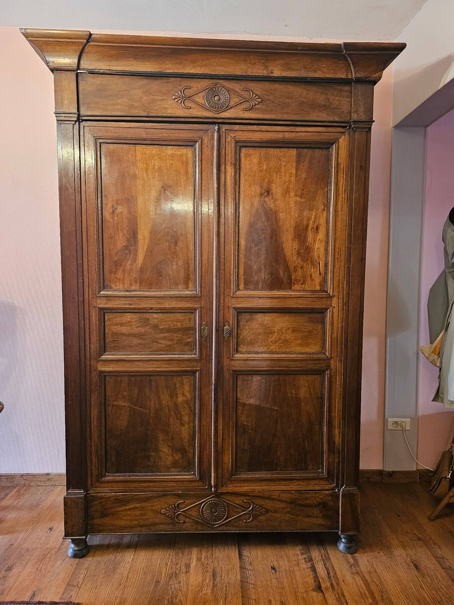 Directoire period wardrobe in solid walnut.