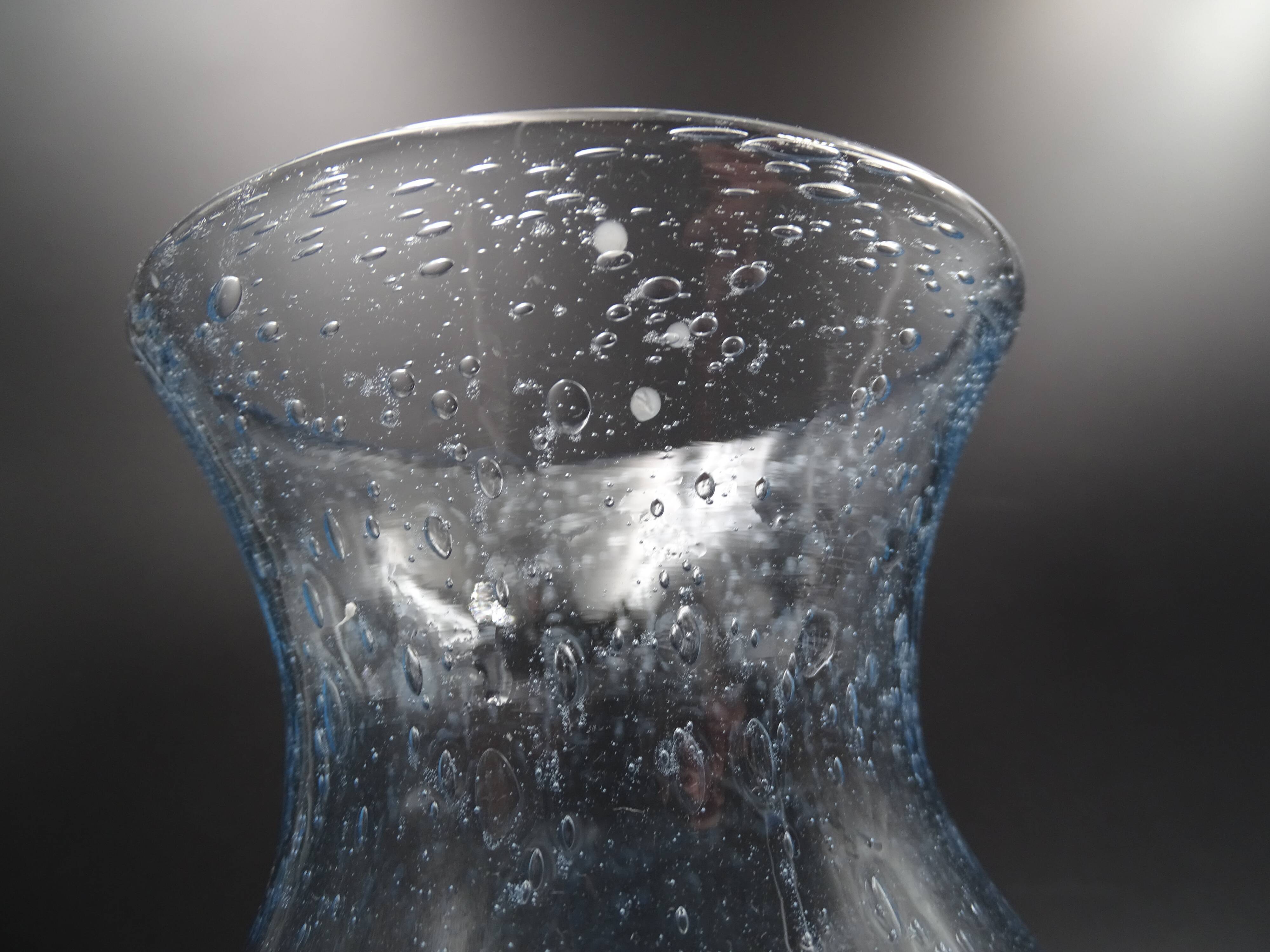 Candlestick or photophore in sky blue bulled glass, signed Biot