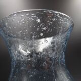 Candlestick or photophore in sky blue bulled glass, signed Biot