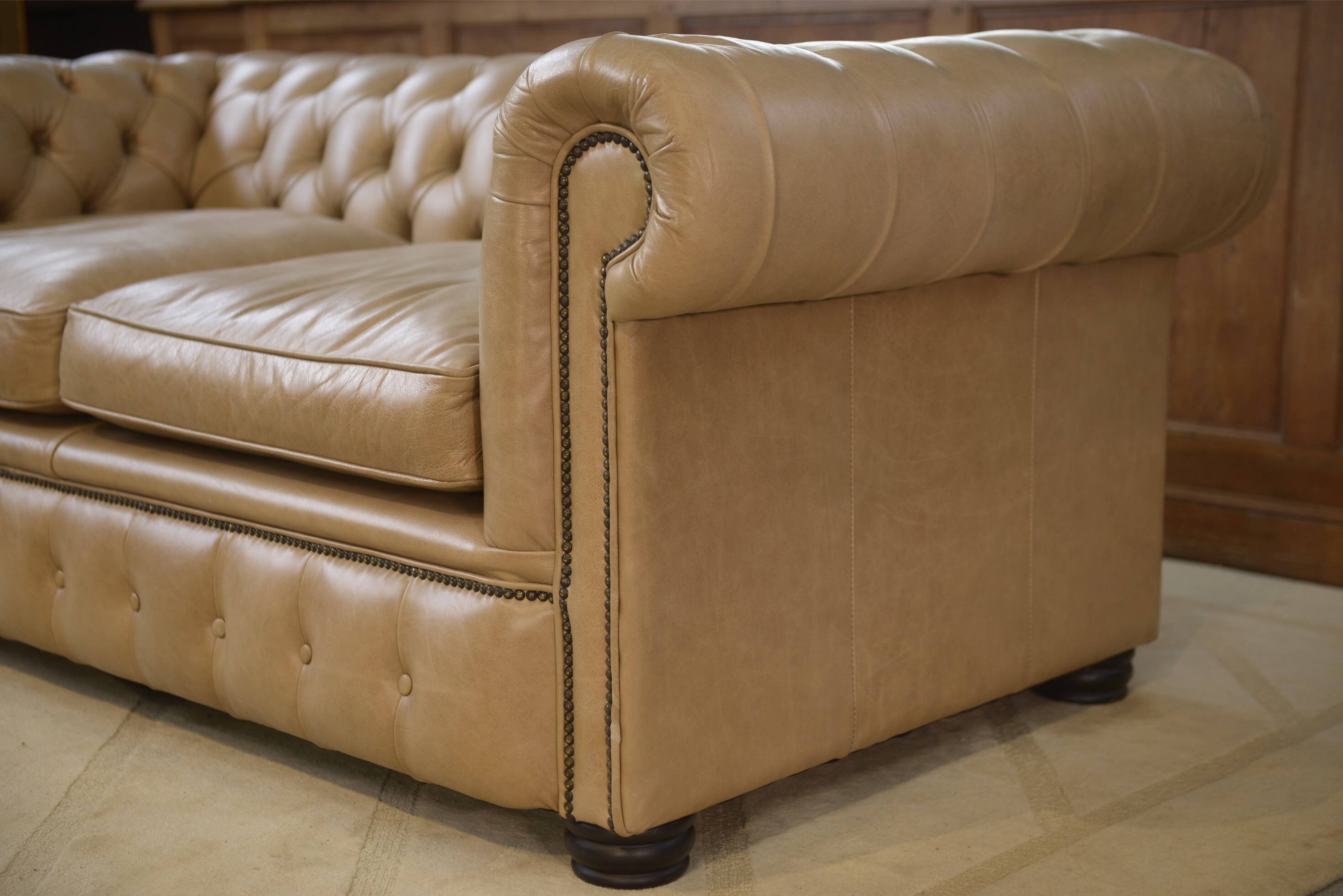 Beige leather Chesterfield sofa handmade in England.