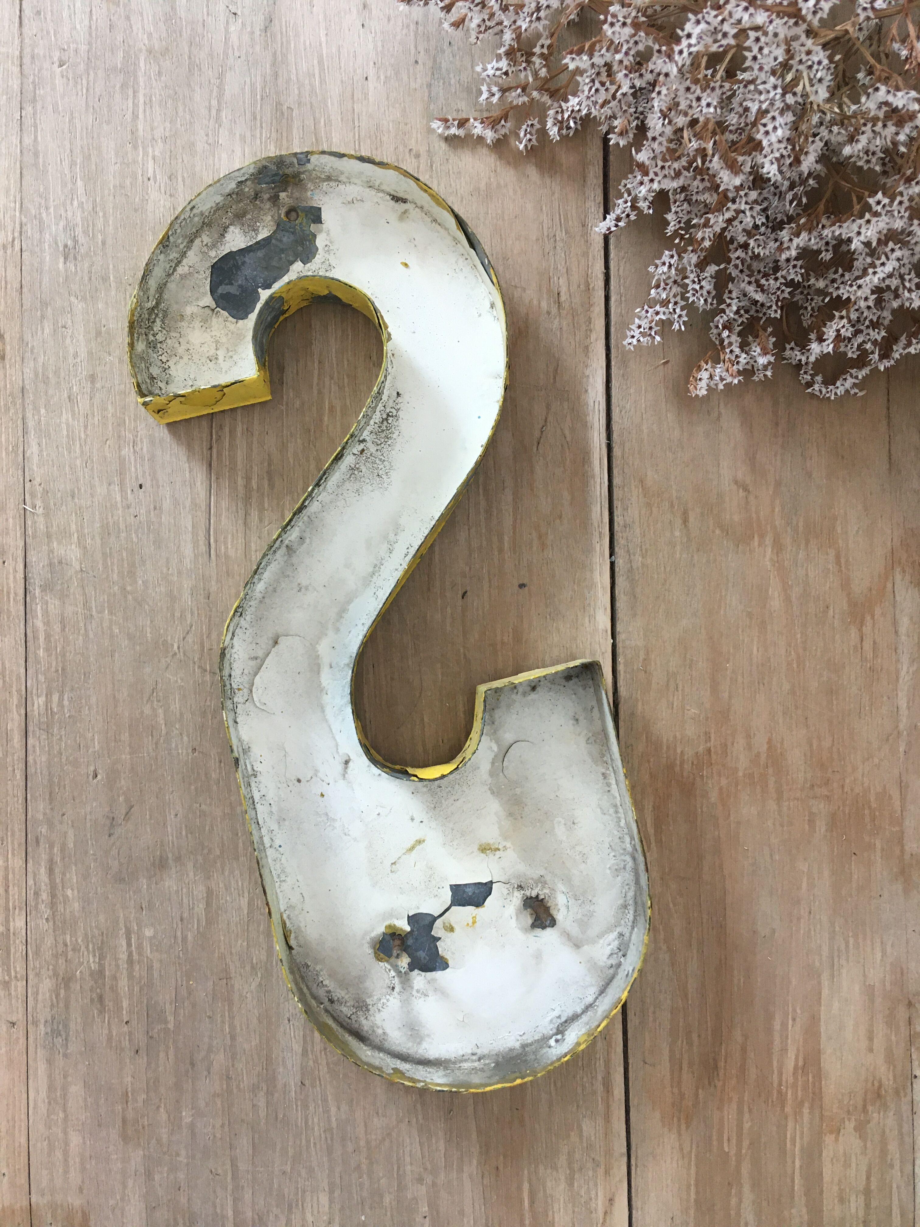 Vintage yellow sign letter S