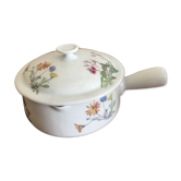 Berry's high porcelain caquelon sausage soup is decorated with floral decoration