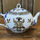 Tea and coffee service in Gien earthenware from the late 19th century with Renaissance decoration.