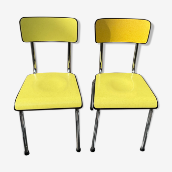 Pair of formica yellow tubauto chairs