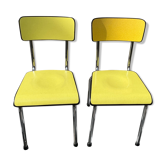 Pair of formica yellow tubauto chairs
