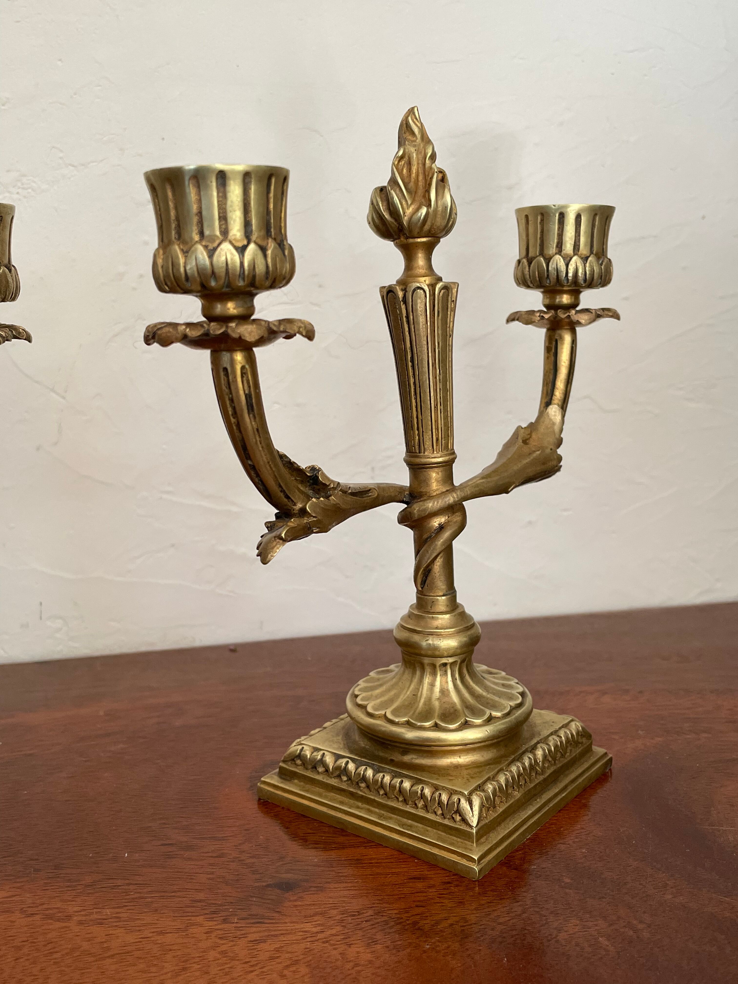 Pair of candle holders in gilded bronze nineteenth century