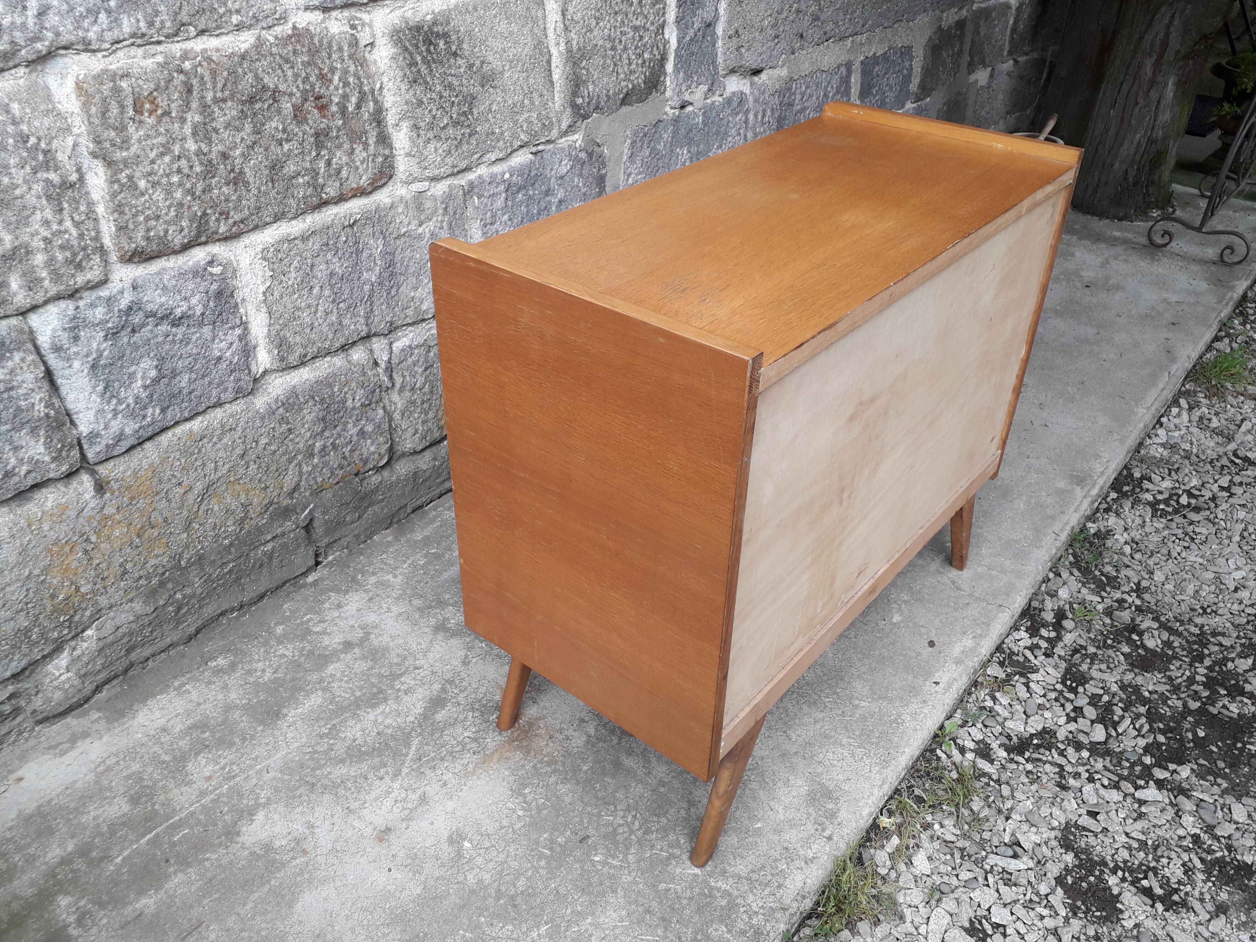 Vintage chest of drawers in rattan compass feet