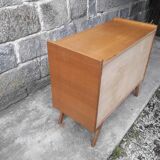 Vintage chest of drawers in rattan compass feet