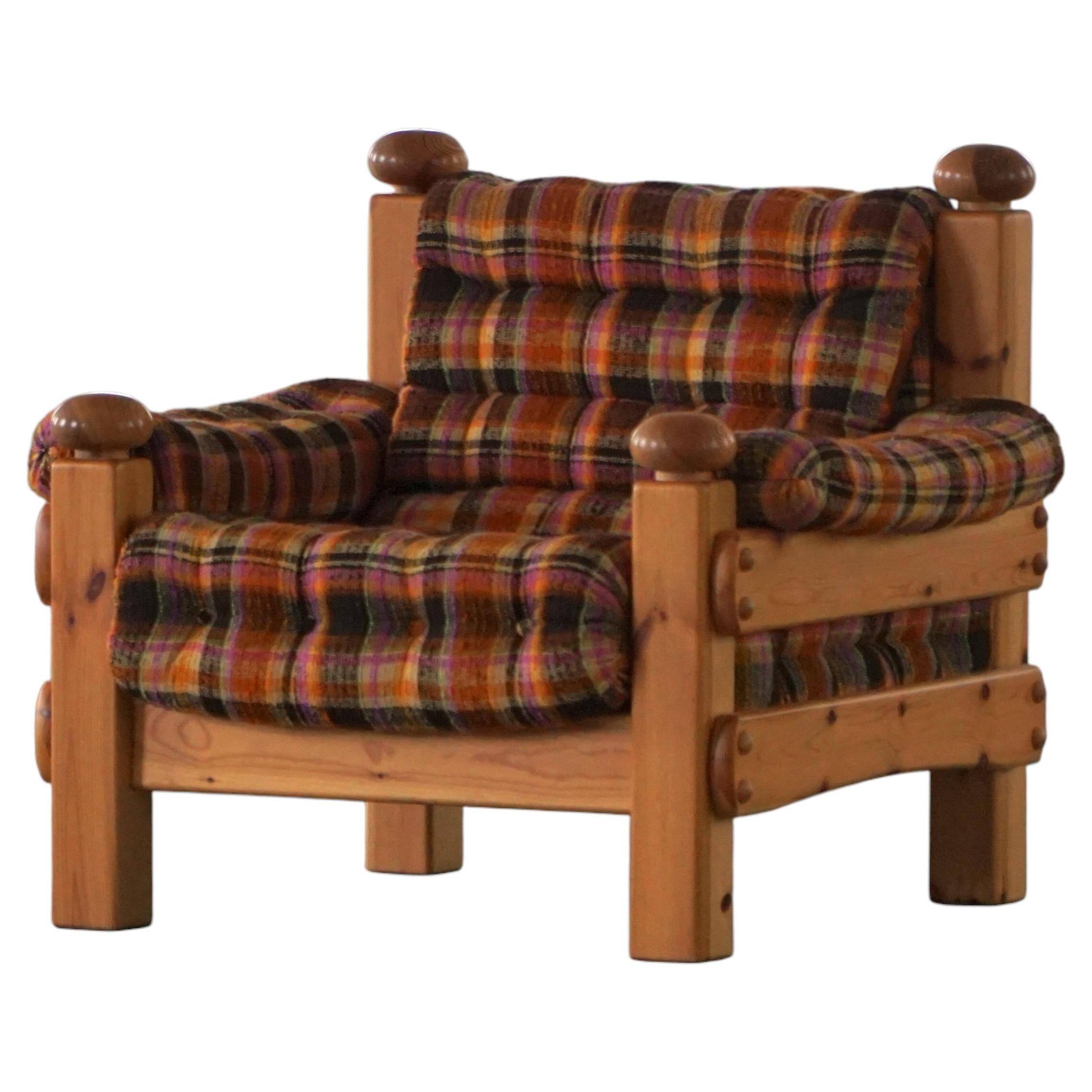 Brutalist lounge chair in solid pine, Swedish modern, made in the 1970s.