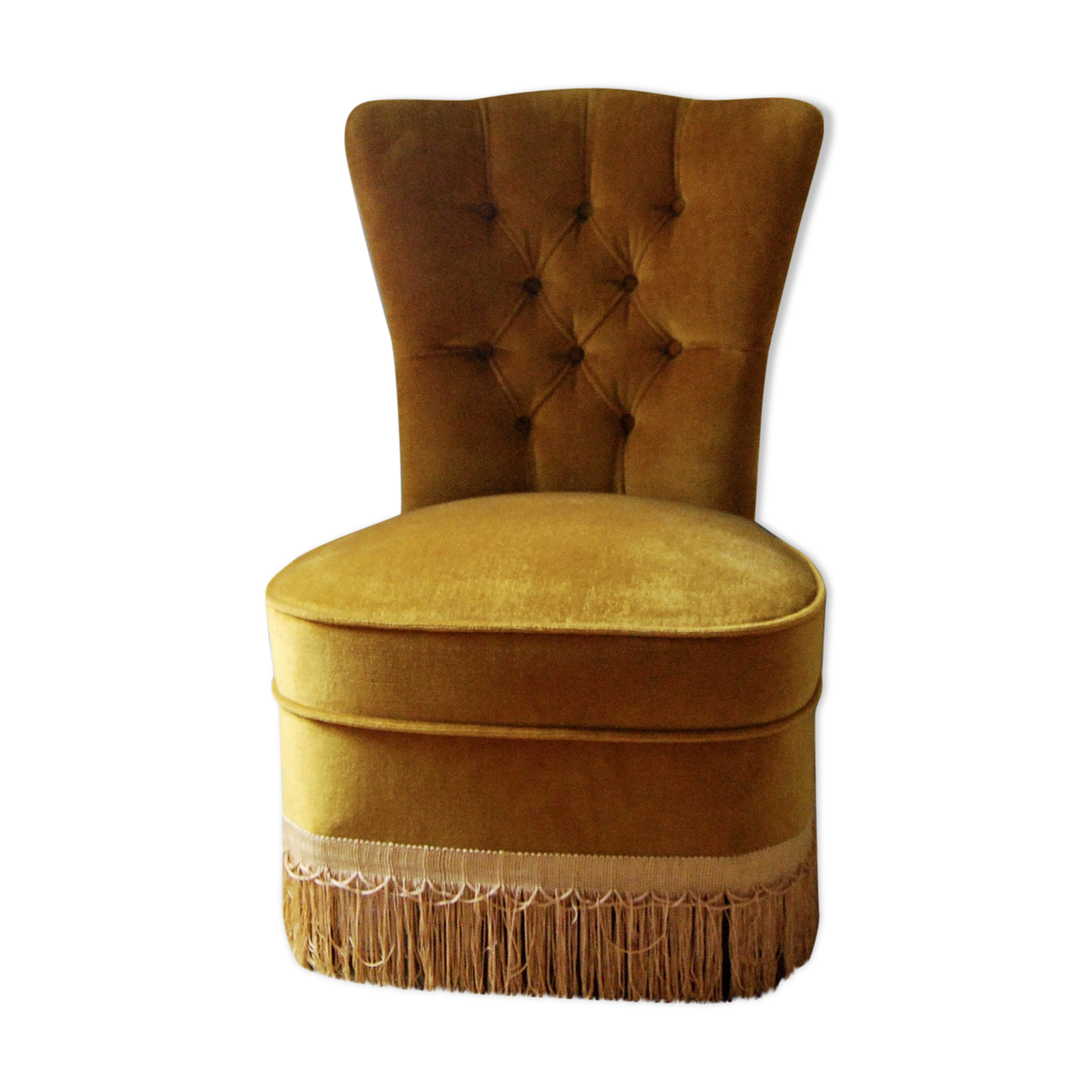 Toad in yellow velvet armchair