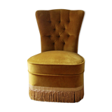 Toad in yellow velvet armchair