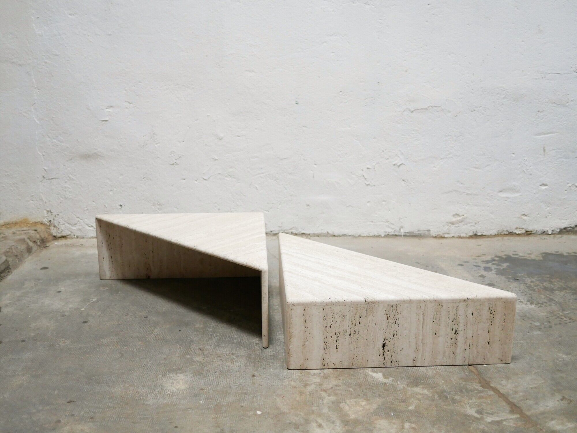 Series of 2 vintage travertine coffee tables published by Roche Bobois