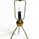 Mid Century tripod brass table lamp with a wrapped nylon strip lampshade