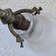 Vintage wall sconce in brass with Holophane glass tulip.