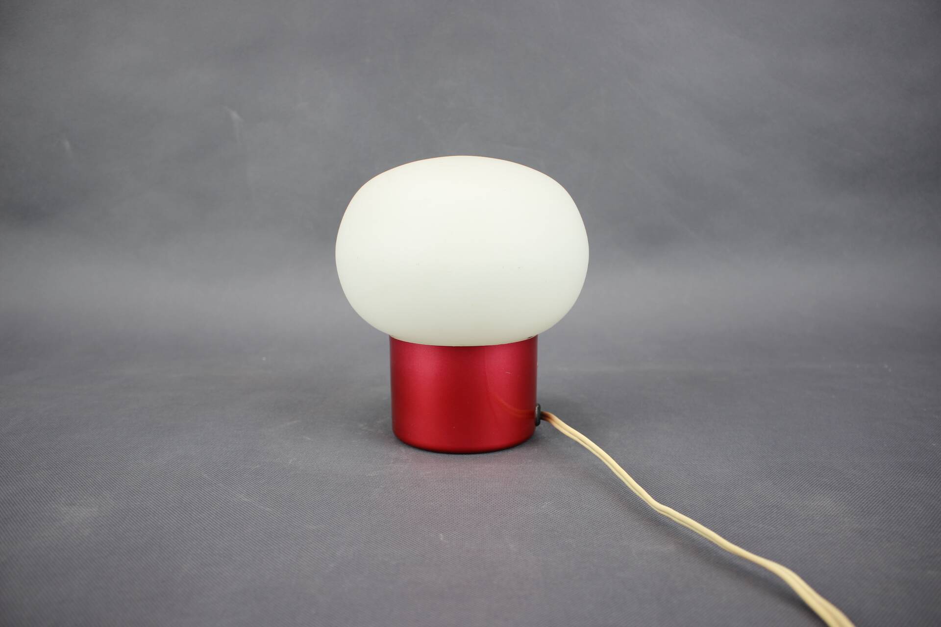 Burgundy Red opaline glass table lamp from the 1970s space age.
