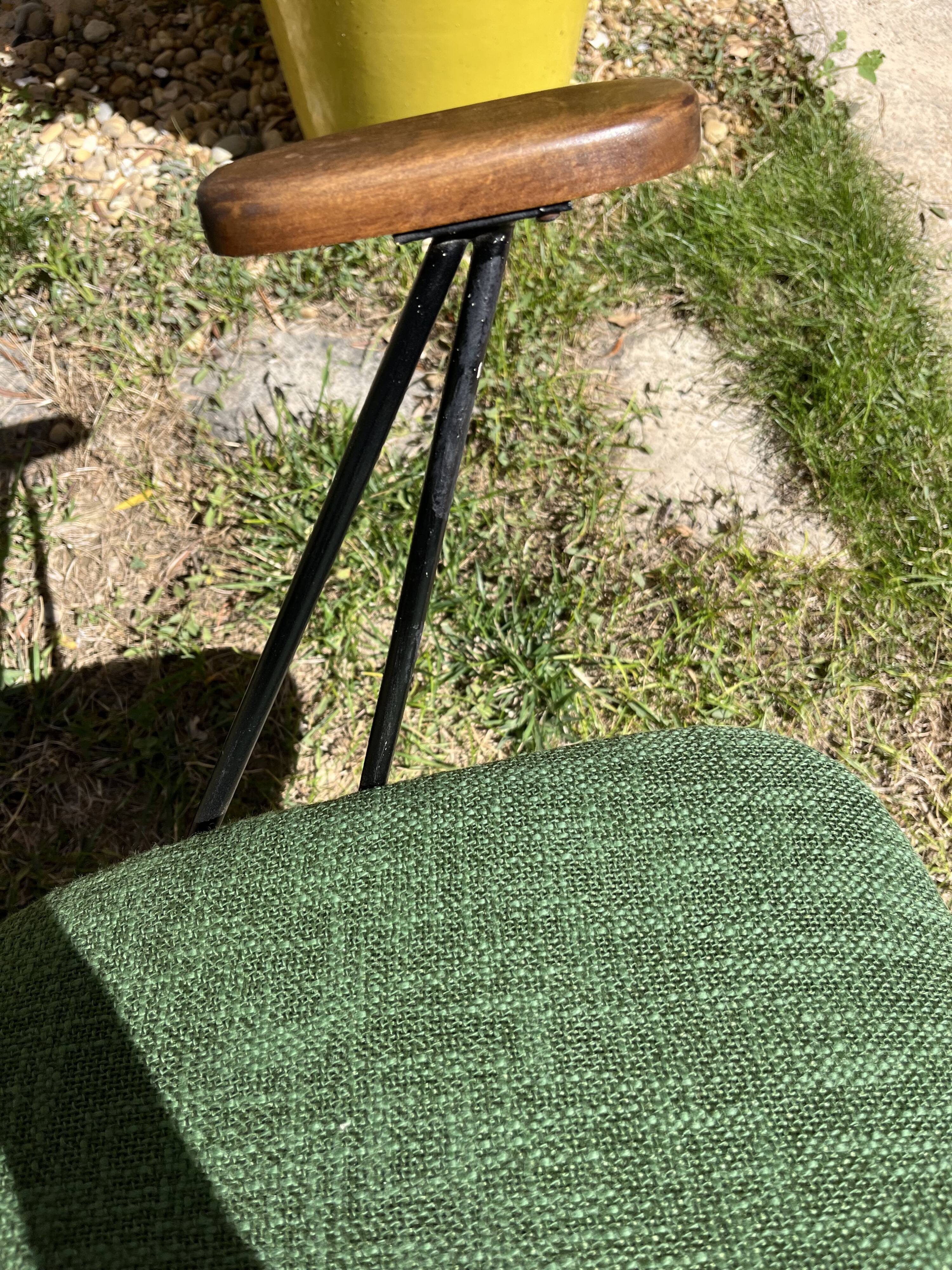 50s chair with armrests.