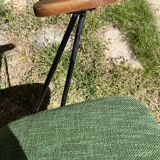 50s chair with armrests.