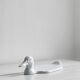 White porcelain dish in the shape of a duck.