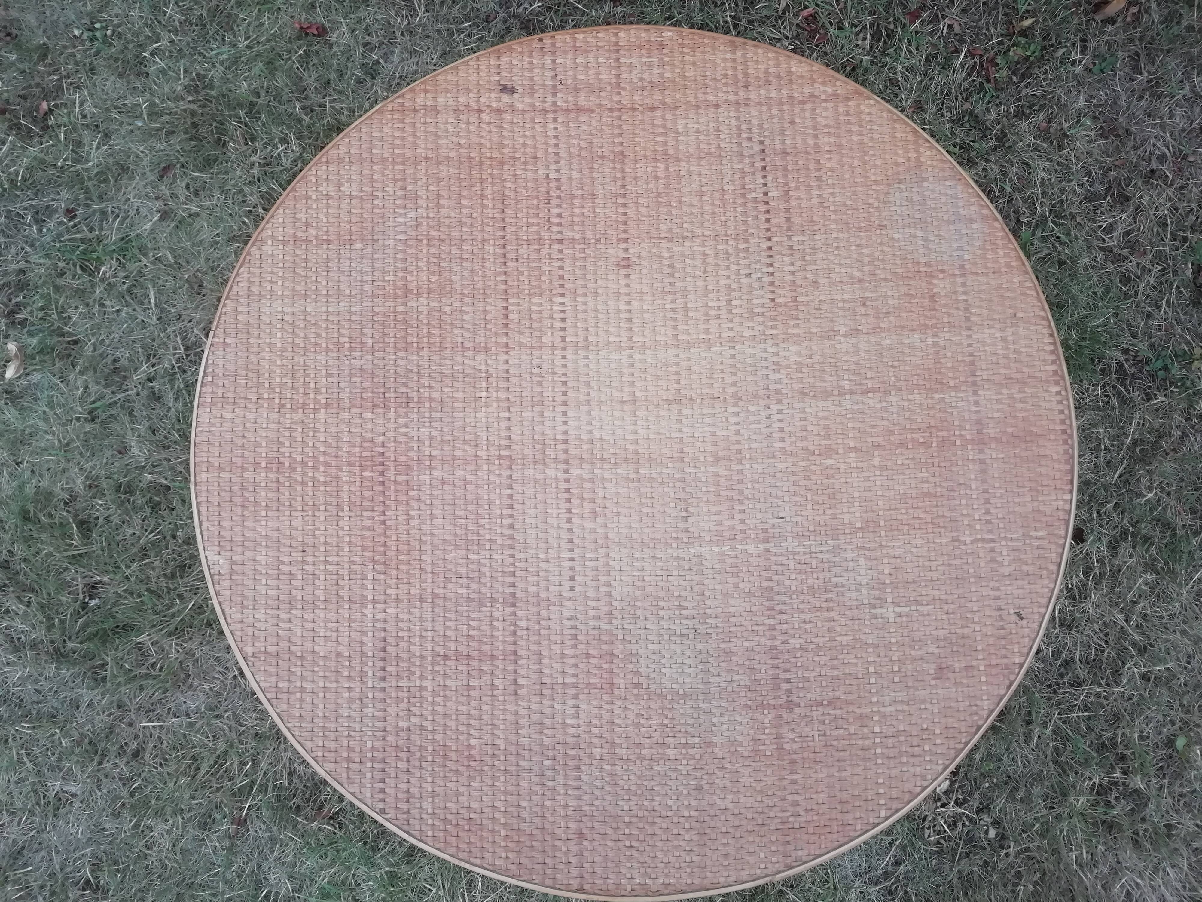 Vintage round rattan tripod coffee table