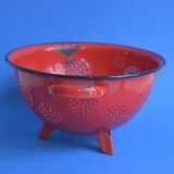Vintage red enameled sheet metal colander