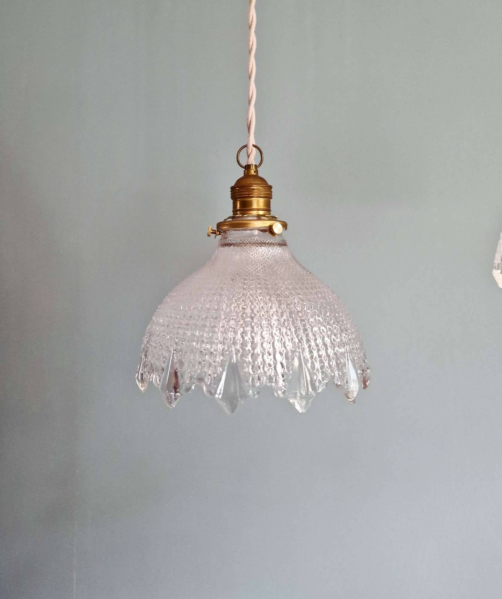 Trio of Art Deco scalloped clear glass pendant lights, 1920-30