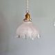 Trio of Art Deco scalloped clear glass pendant lights, 1920-30