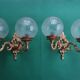 Pair of large double-light wall sconces in vintage brass and glass