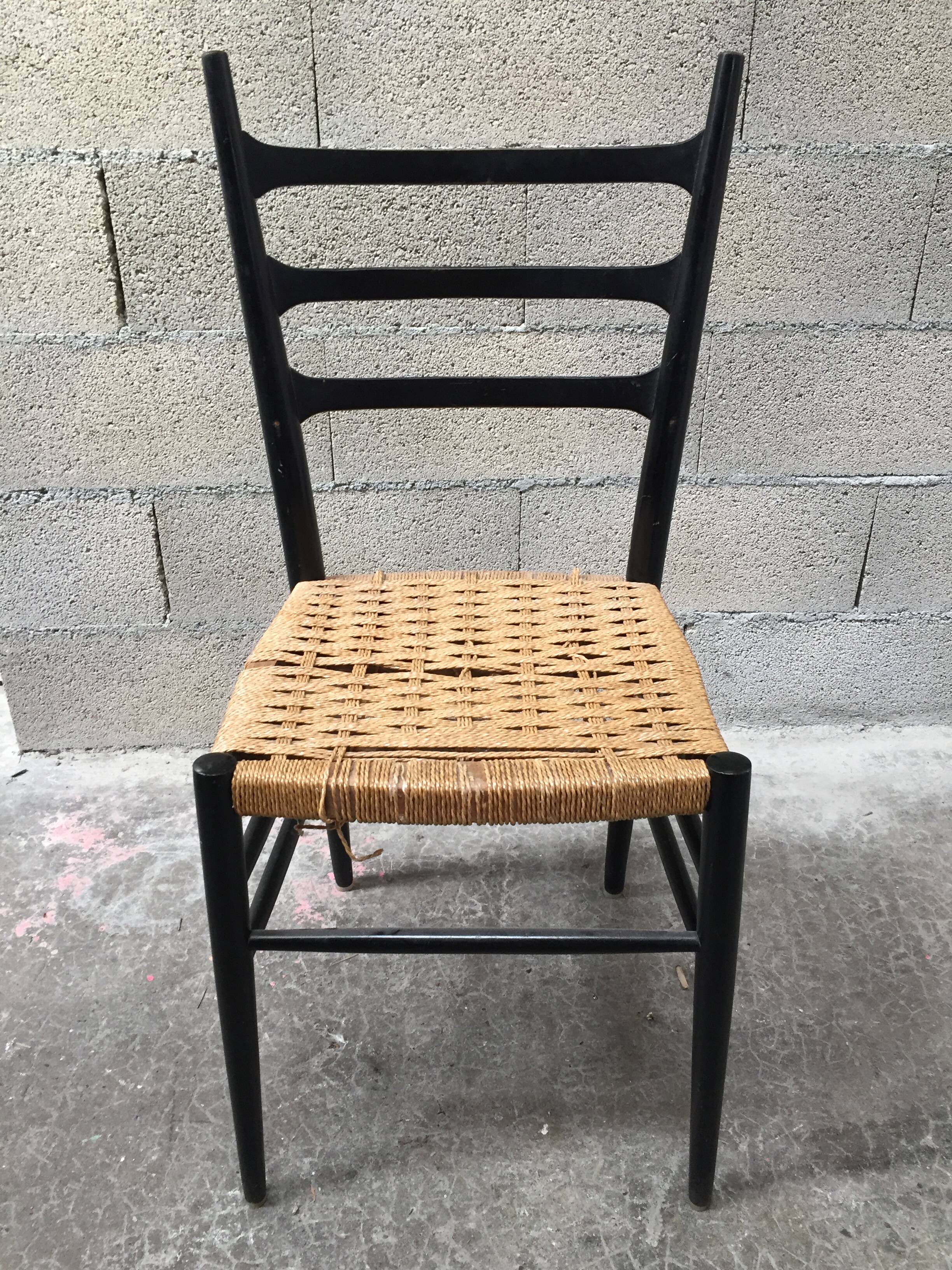 Set of 7 blackened wooden chairs, 1960s vintage
