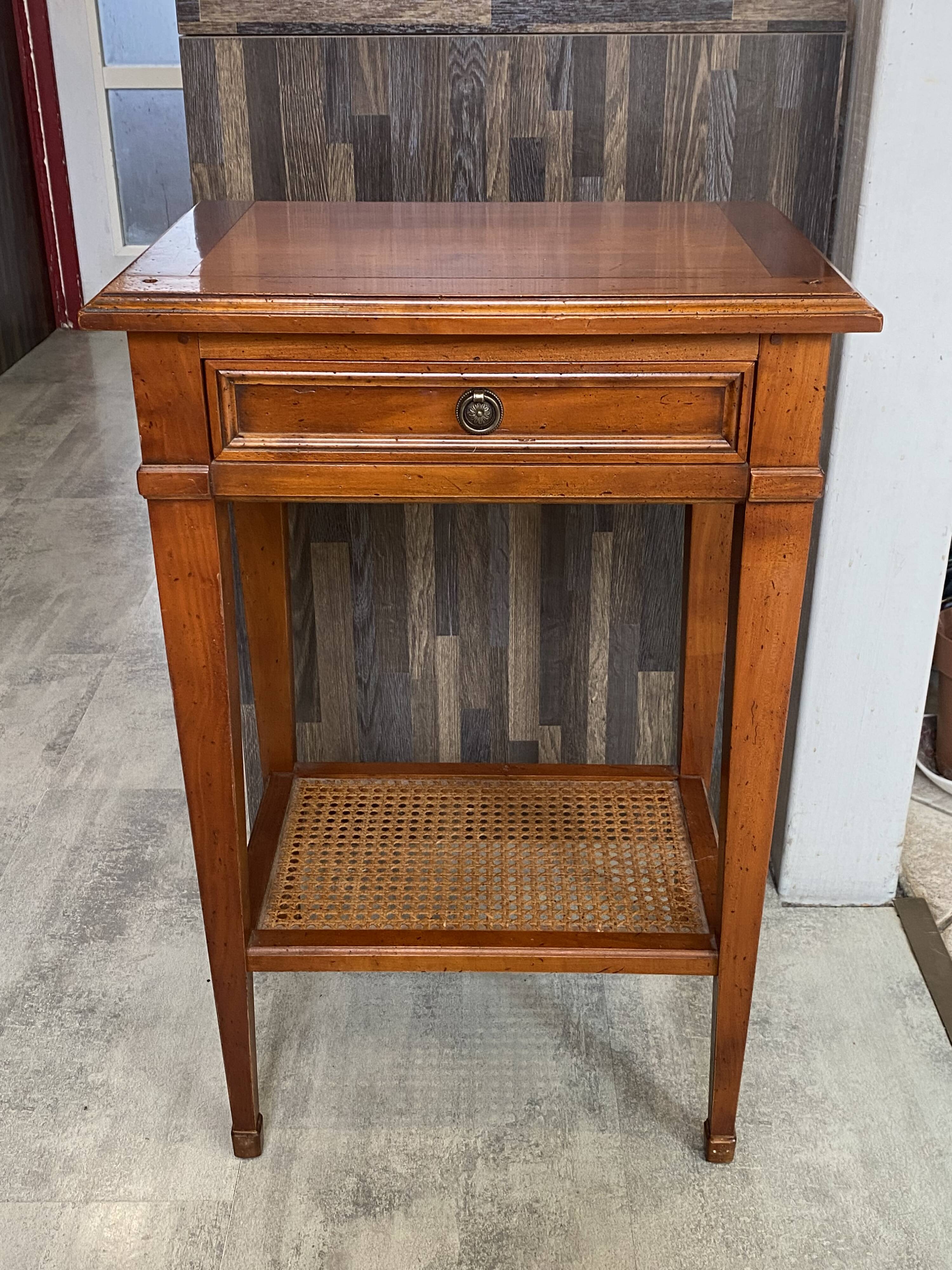 Occasional table in cherry wood, 1 drawer, 1 cane shelf, 1950.