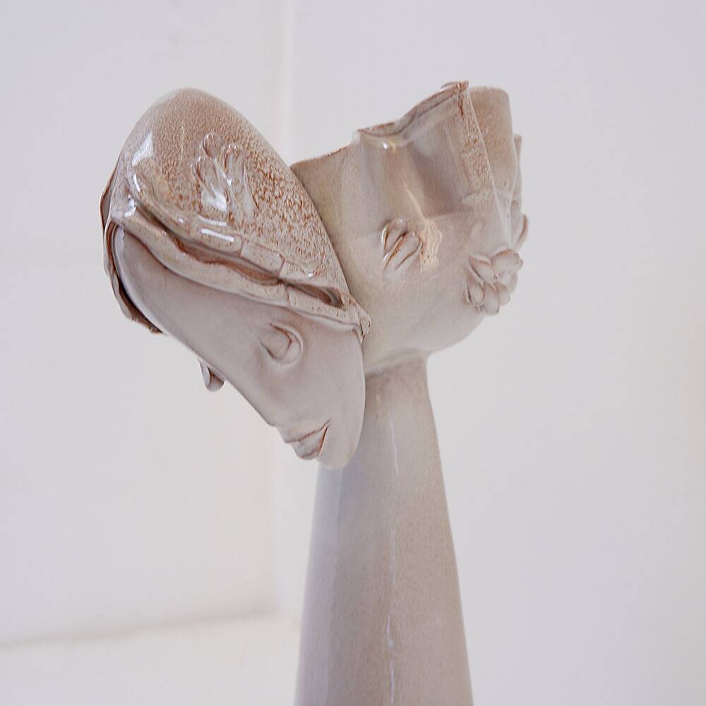 Ceramic sculpture of a female face - flower vase decoration