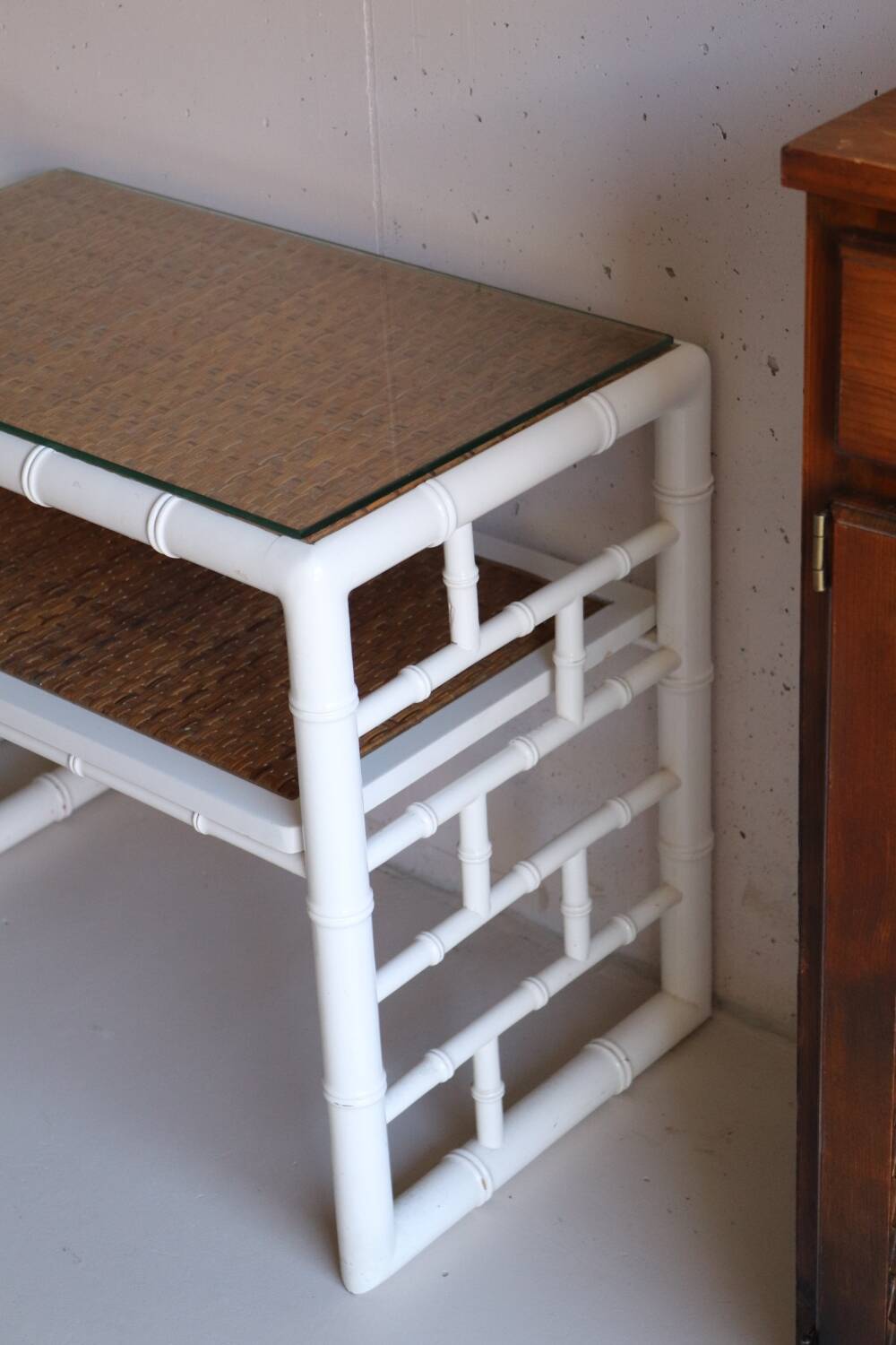 Pair of bedside tables in bamboo effect wood and woven wicker