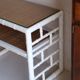 Pair of bedside tables in bamboo effect wood and woven wicker