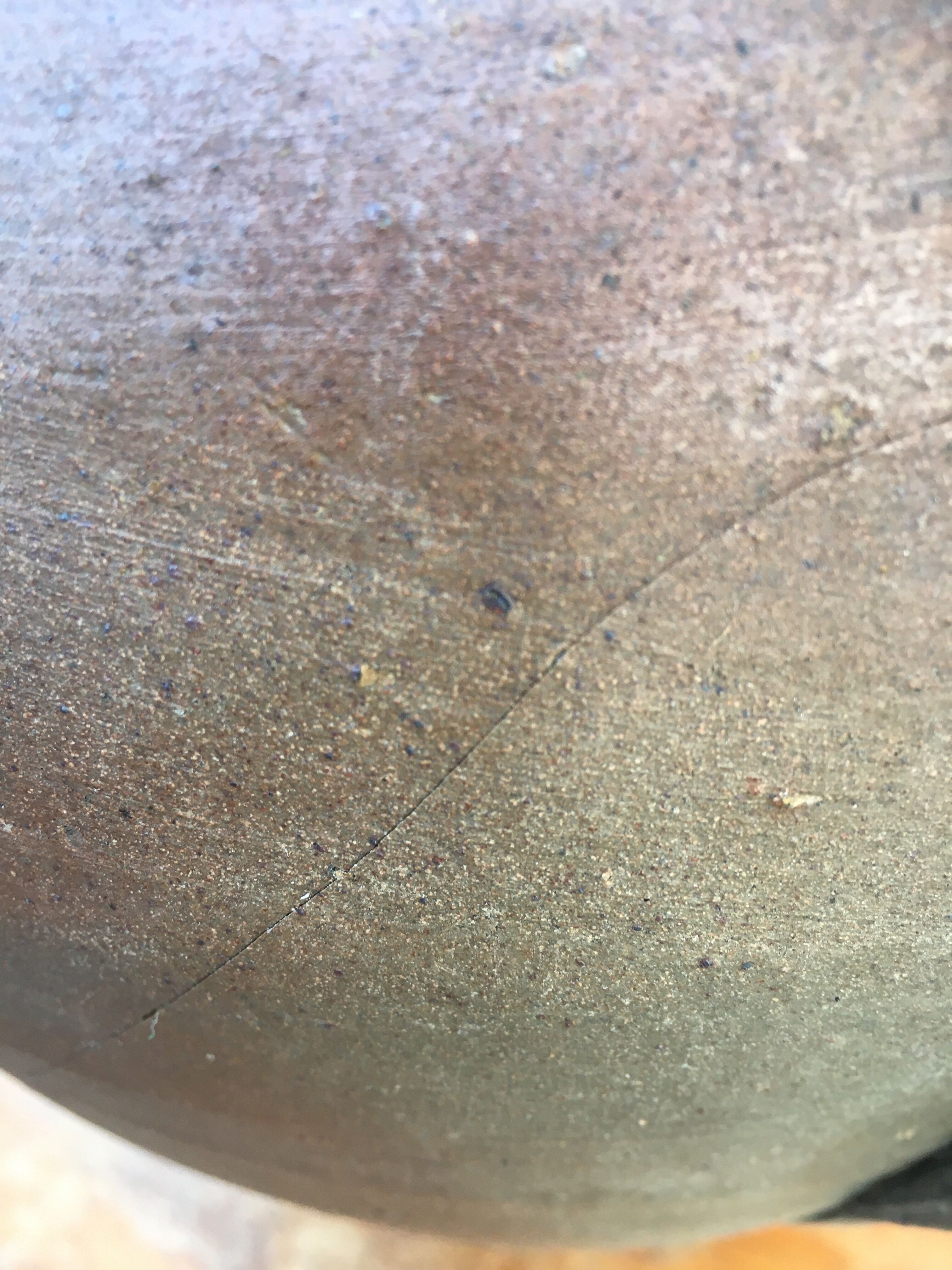 Old jug with two sandstone handles