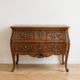 Louis XV style commode in carved wood