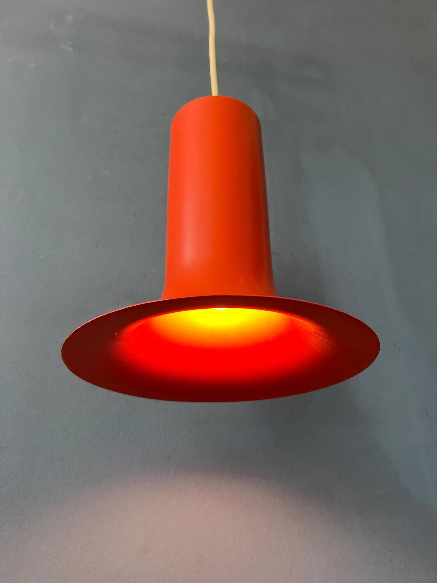 Vintage orange Raak cone pendant lamp