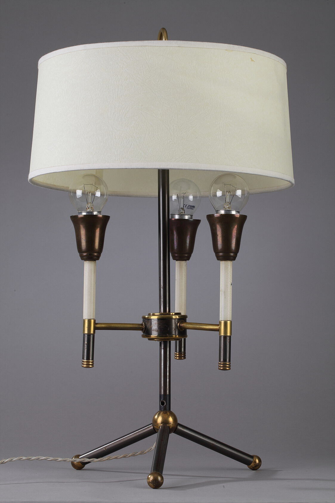 Modernist table lamp in black and gold lacquered metal