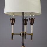 Modernist table lamp in black and gold lacquered metal