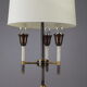 Lampe de table moderniste en métal laqué noir et doré