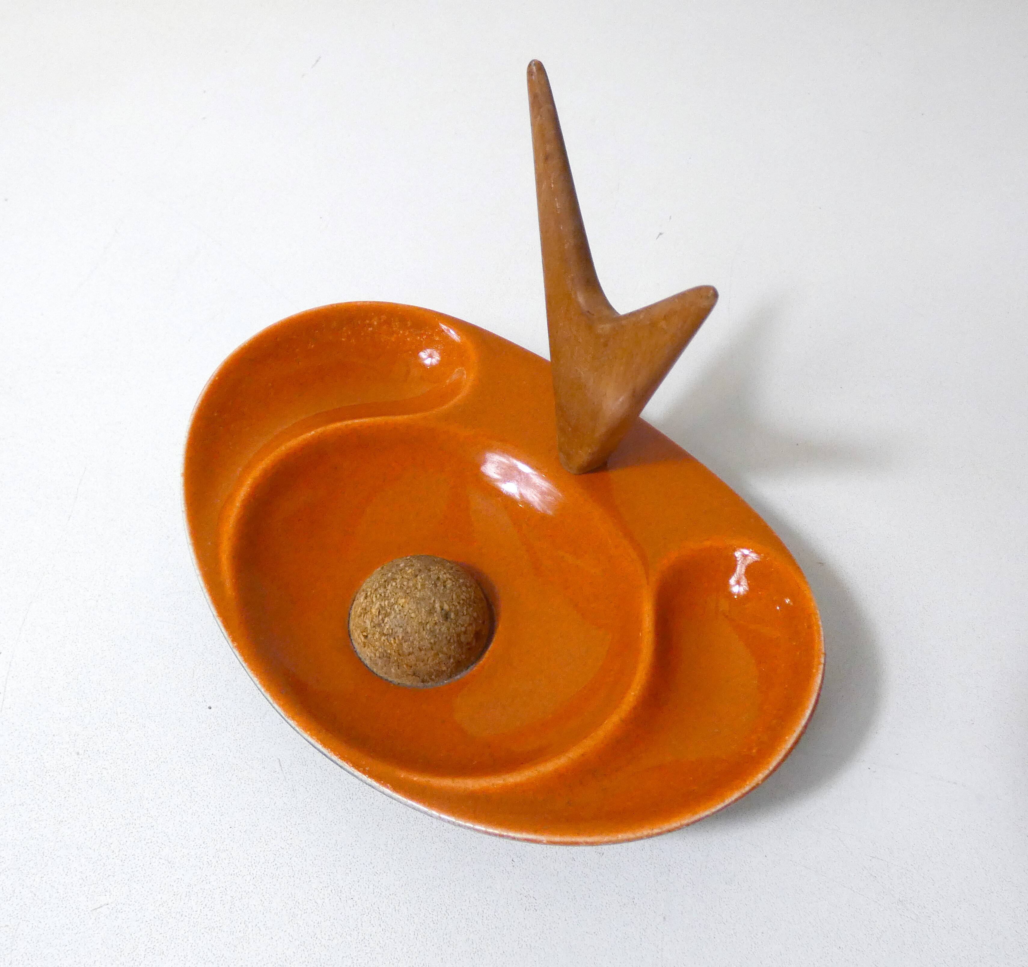 old ceramic and asymmetrical wood pipe ashtray