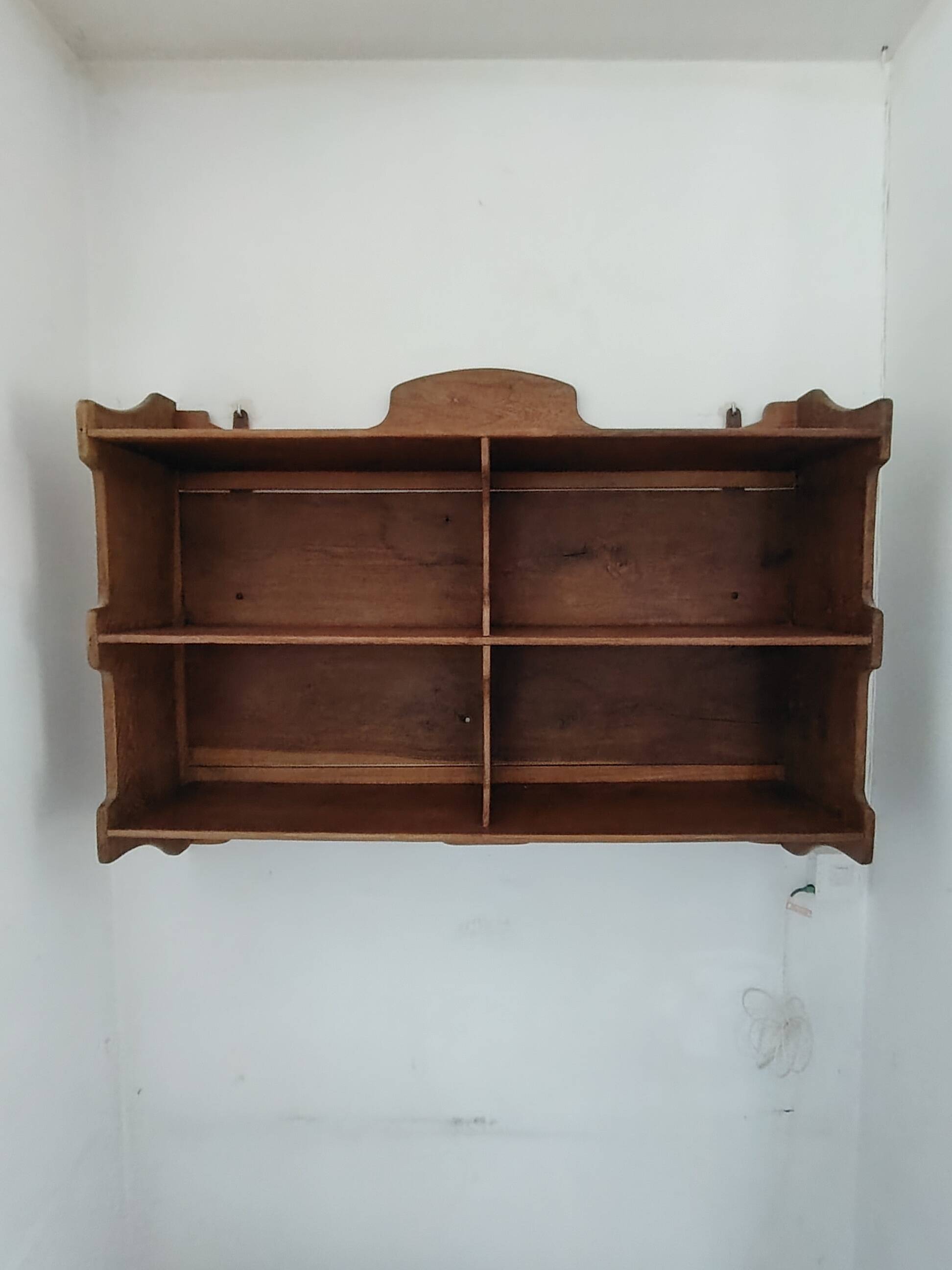 Large antique wall shelf with solid wood compartments.