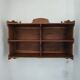 Large antique wall shelf with solid wood compartments.