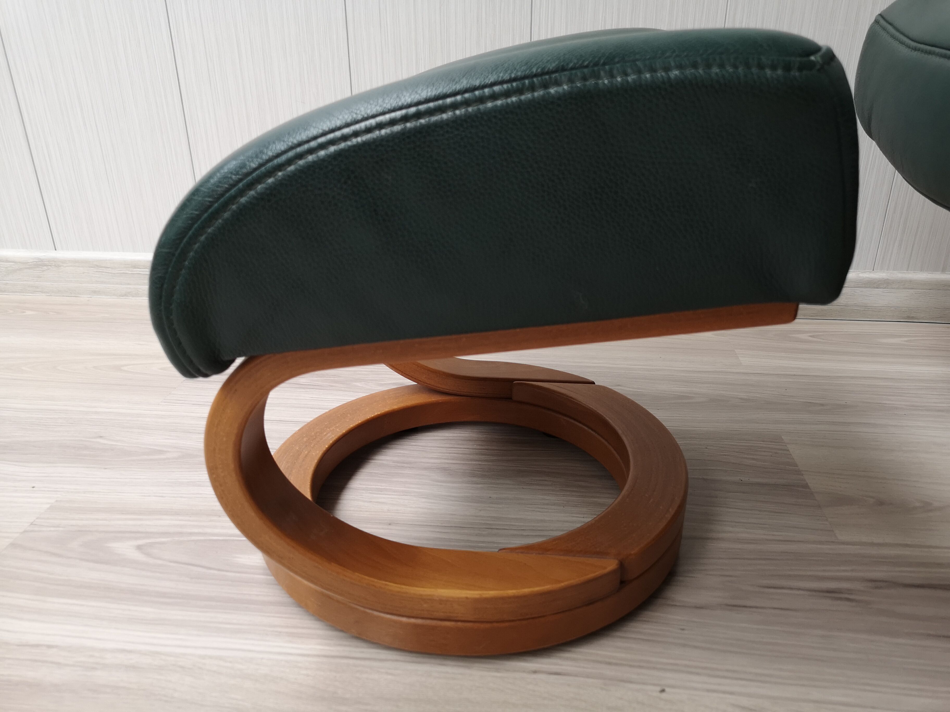 Mid - century leather armchair with footrest with relax function from himolla