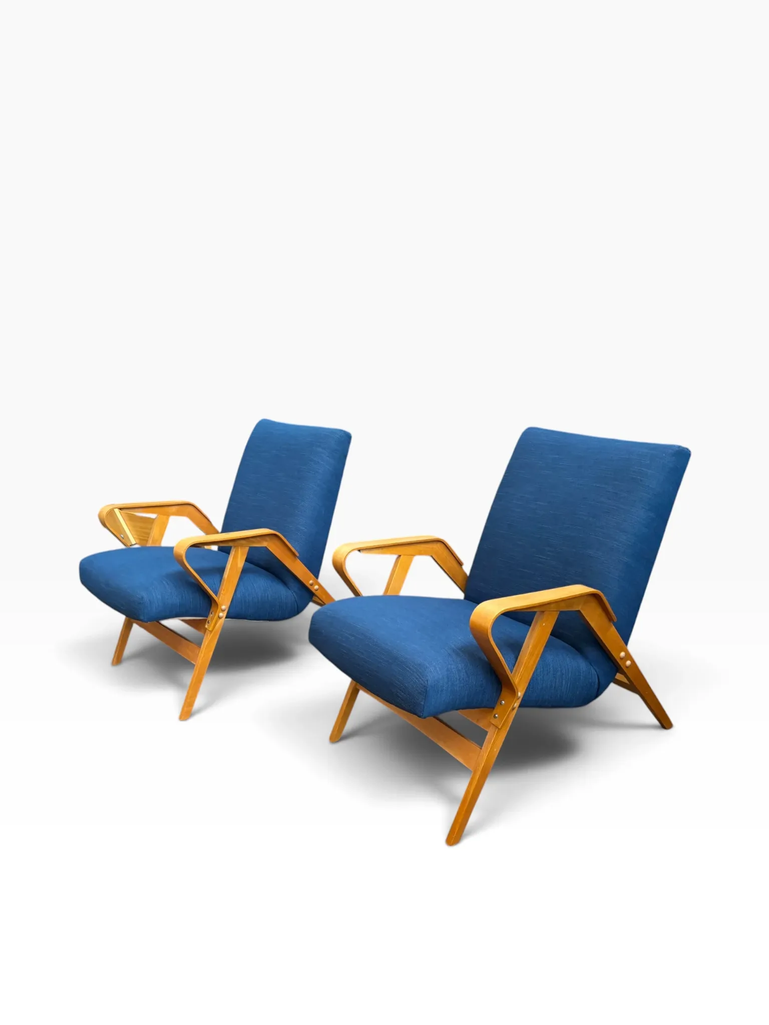 Set of 2 blue lounge chairs restored by František Jirák for Tatra Nabytok.
