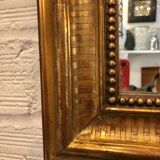 Mirror golden  92x140cm
