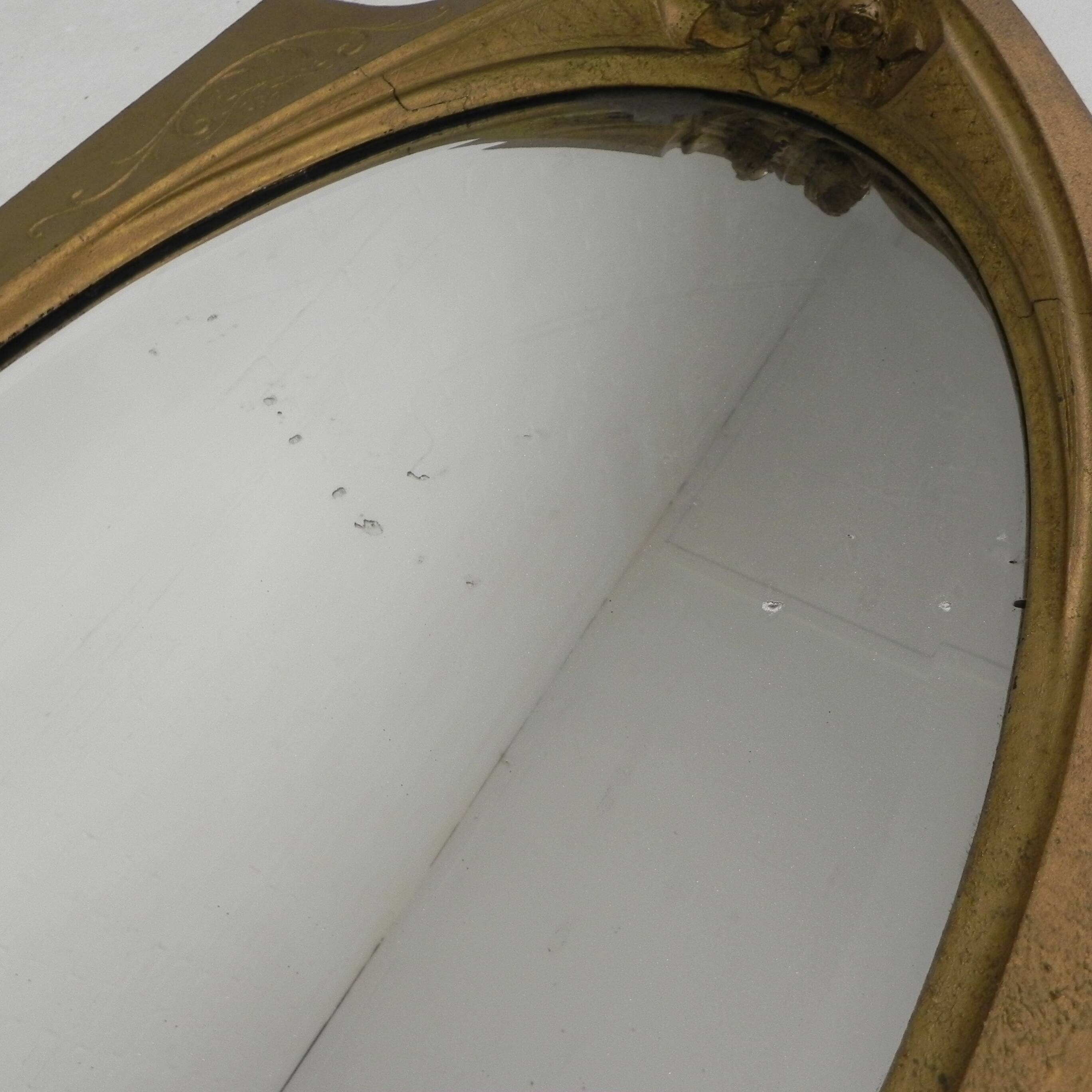 Oval gold mirror with faceted edge, 1950s