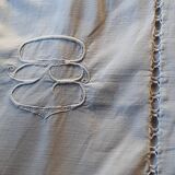 Old hand-embroidered linen sheet