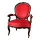 Napoleon III medallion armchair in carved wood and red velvet.