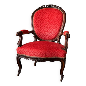 Napoleon III medallion armchair in carved wood and red velvet.