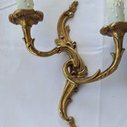 Old pairs of bronze wall sconces