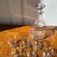 Gold-rimmed decanter and liqueur glass service